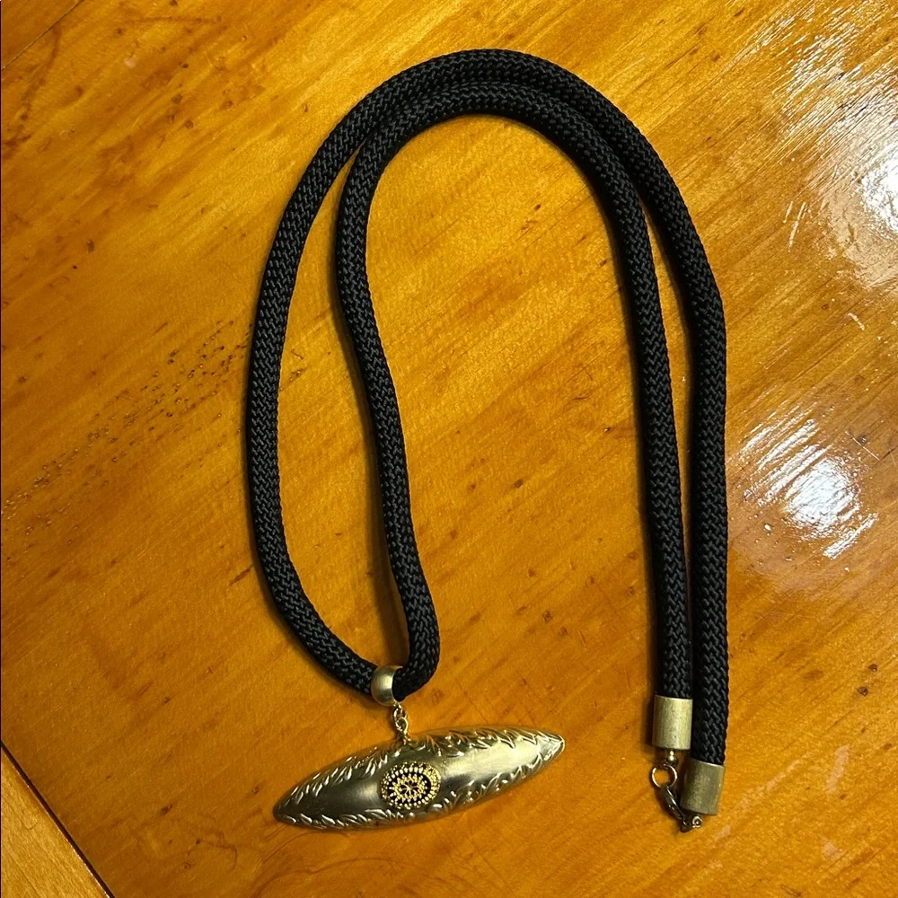 Gold Tone Geometric Engraved Pendant on Black Cord  Necklace‎ 36 Inch